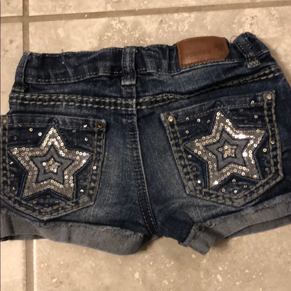 Vigoss girls Sz 4 jeans with star pockets